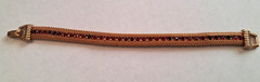 Vintage Gold Tone Mesh Bracelet w/ Channel Set Red Prong Set Stones 7″ Pre-owned
