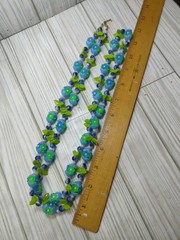 VTG Hong Kong costume jewelry necklace, specifically recognized by its clasp…
