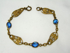 …Art Deco Gold Tone Floral Panels & Blue Glass Bracelet…