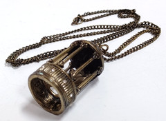 Brass Tone Bird in Cage Pendant Necklace 32″ Chain Vintage Style