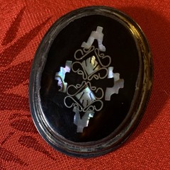 Vintage Taxco sterling silver brooch with abalone shell and dark horn or onyx.