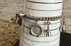 Silver Tone Charm Bracelet W/9 Charms Size 6 3/4”
