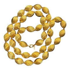 Signed Crown Trifari Vintage Gold Tone Ribbed Oval Bead Opera Long Necklace