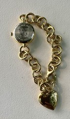 vintage Gruen Gold-Tone Charm Bracelet Watch.