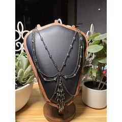 Layered Chain Necklace with Iridescent Beads and Tassel Charm