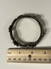 Vintage Silver Toned Bangle Bracelet Adorned with Flowers