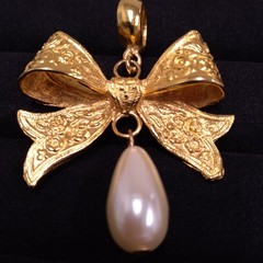 Dauplaise Gold Tone Bow Pendant with Faux Pearl Dangle (No Chain)