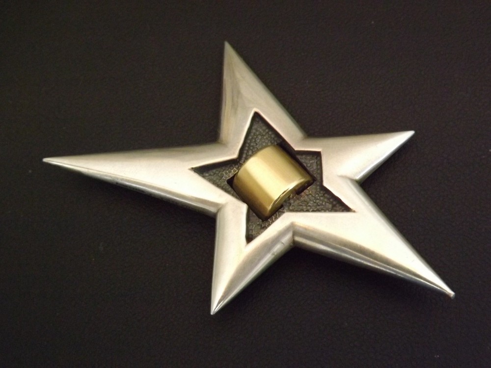 1989, Sterling silver and 18K yellow gold large star pin by Pedro Boregaard, NY