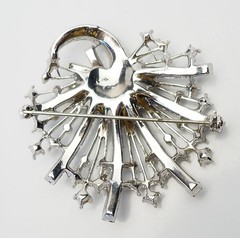 Antique silver tone metal and rhinestones sparkling swirl brooch pin