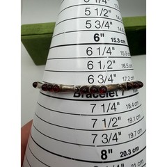 sterling silver tennis-style link chain bracelet cabochon-cut red Baltic amber