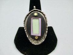 VINTAGE DAVID JONES 22 KT YELLOW GOLD AND STERLING SILVER PENDANT