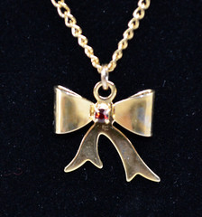 Vintage Gold Tone Necklace & Bow Shaped Pendant with Red Rhinestone