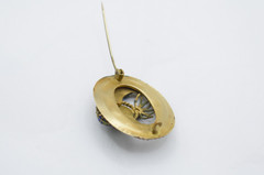 Antique Egyptian Revival winged scarab brooch featuring vibrant enamel work