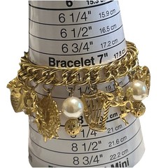 Vintage Style Gold tone Charm Bracelet Unmarked Size 7” Filigree Charms
