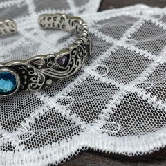 Openwork carved blue topaz bracelet for women, vintage style.