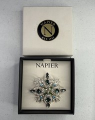 Napier silver-tone snowflake pin/brooch featuring blue and green rhinestones NOS