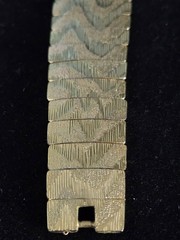 Les Bernard Inc Bracelet Wide Articulated Link Bracelet Textured Wave Pattern