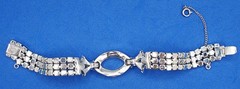 VINTAGE SARAH COVENTRY PRONG SET CRYSTAL RHINESTONE SILVER TONE TAPERED BAGUETTE