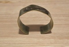 vintage mixed-metal cuff bracelet featuring S spiral design from 1950s-1970s.