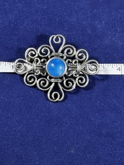 VINTAGE BLUE CABOCHON CENTER UNSIGNED SILVERTONE SWIRL SPIRAL BROOCH
