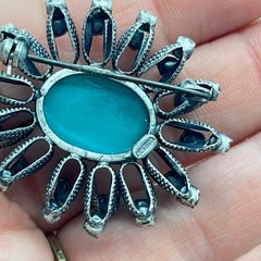 Vintage Austria Green Rhinestone Cabochon Sunburst Brooch Gunmetal Tone 1.5in