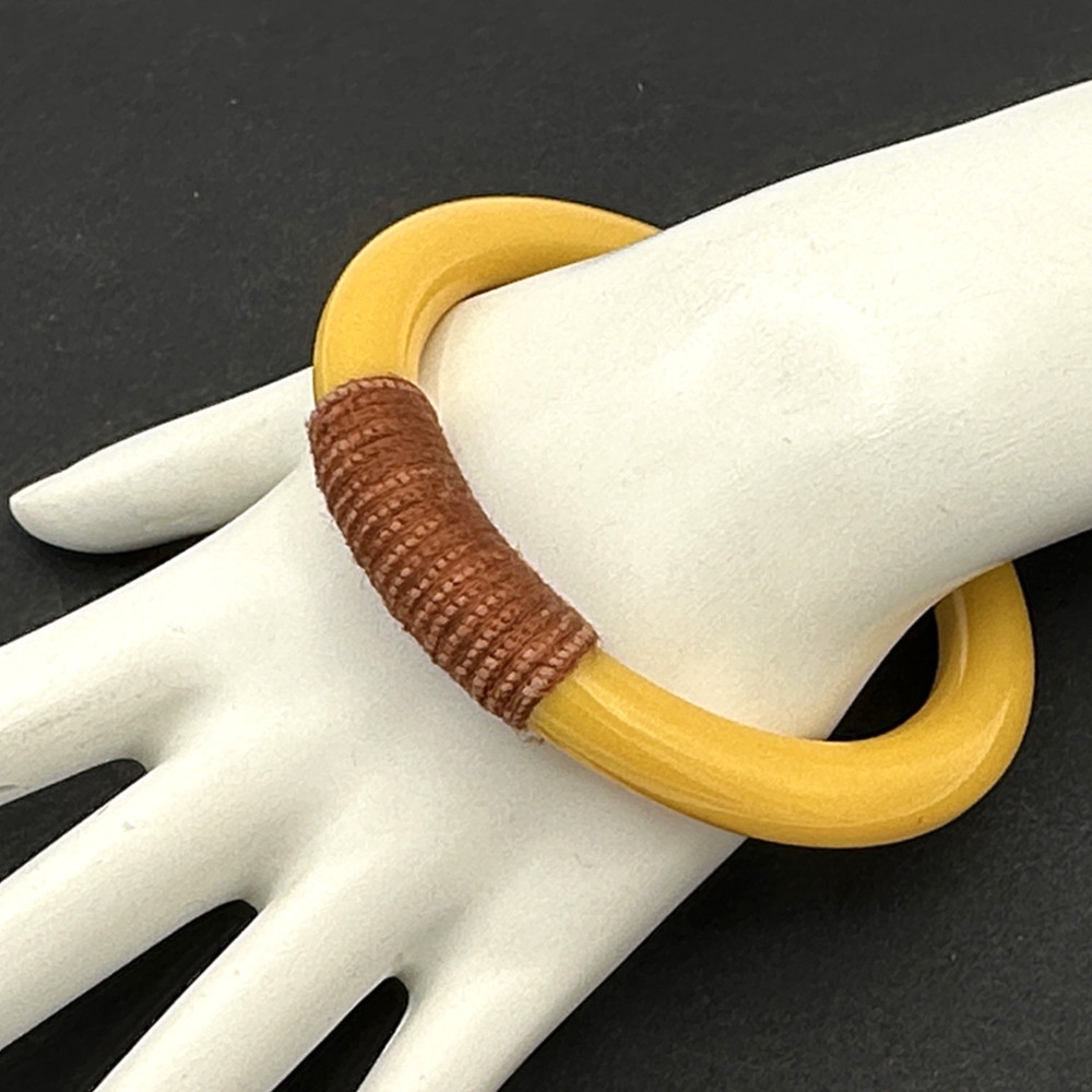 BAKELITE vintage bracelet – yellow tubular bangle w/ wrapped brown cord 8″
