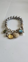 Vintage Avon Multiple Charm Silvertone Stretchable Locket Bracelet 8+