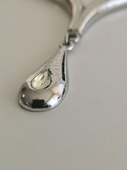 silver-toned V-shaped collar necklace teardrop pendant matching teardrop…