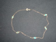 VTG.GOLD TONE 15 IN.DAINTY CHAIN NECKLACE WITH SMALL GREEN RHINESTONES,GUC