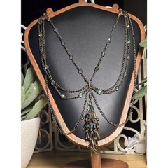 Layered Chain Necklace with Iridescent Beads and Tassel Charm