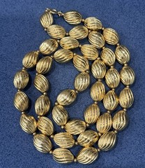 Signed Crown Trifari Vintage Gold Tone Ribbed Oval Bead Opera Long Necklace