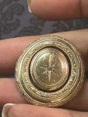 Vintage 1970s Avon Spinner Brooch Gold Tone Rotating Starburst Rhinestone Signed