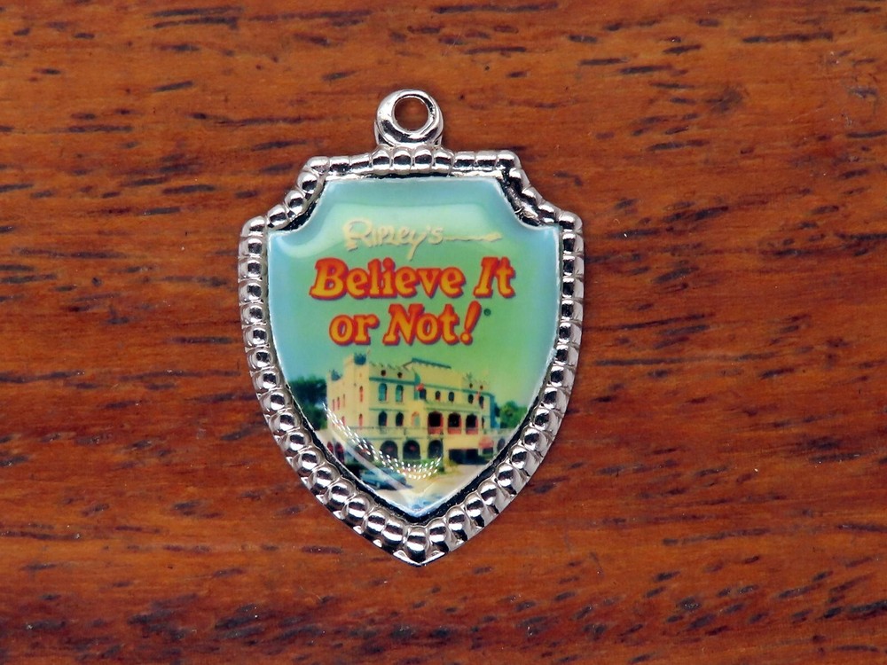 Vintage silver RIPLEYS BELIEVE IT OR NOT MUSEUM TRAVEL SHIELD charm 4-13
