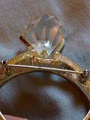 Vintage AJC Rhinestone Lucite Gold Tone Ring Brooch.