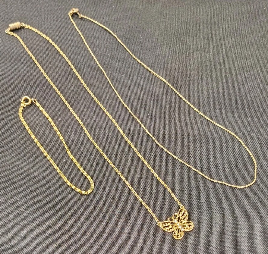 3-piece Gold Tone Lot: 16″ Revlon Necklace 15″ Butterfly Necklace 7″ Bracelet