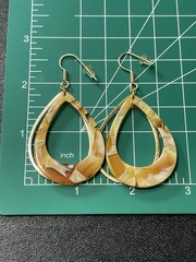 Vintage 2.5” Orange Marbled Lucite Good Tone Metal Dangle Earrings