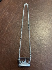 Vintage, Metal Ship Game Piece, Suspended in Resin, on a Silver Plated Chain.WOW