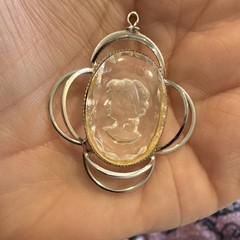 Vintage Silver Tone Oval Clear Cameo Pendant in Silver Setting.