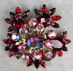 Vintage gold-toned Brooch featuring Ruby Red Navette and round Aurora Borealis