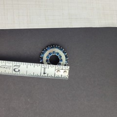 Vintage Small Silver Tone Circle Brooch With Dark Blue Rhinestones