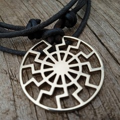 Black Sun Pendant Necklace – Brass Sonnenrad Medallion on Black Cord