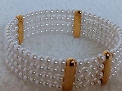 Vintage 4 Strand Faux Pearl Goldtone Tension Cuff Bracelet 7.5 in