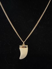 Vintage AVON 1978 Pendant Necklace Gold Chain Faux Ivory 20” Adventure Tooth