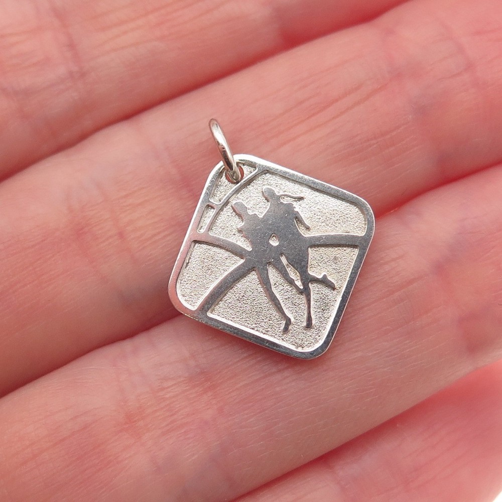 Tiffany & Co. Sterling Silver Vintage Nike Women’s Marathon 2007 Mini Pendant