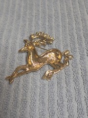 Nolan Miller Christmas Gold Tone Reindeer Brooch with Rhinestones
