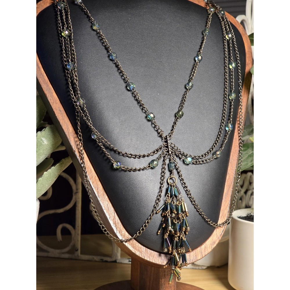 Layered Chain Necklace with Iridescent Beads and Tassel Charm
