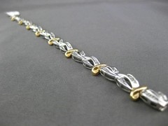 ESTATE 2.0CT BAGUETTE DIAMOND 14KT WHITE & YELLOW GOLD INFINITY TENNIS BRACELET