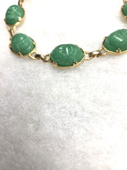 Vtg gold tone green lucite carved Scarab Bracelet