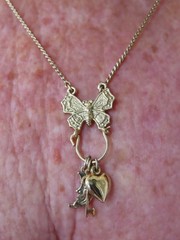 Vintage “1928 Jewelry” Gold Tone w/Butterfly Charm Holder w/Charms