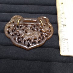 Carved Brown Stone Pendant Gold Tone